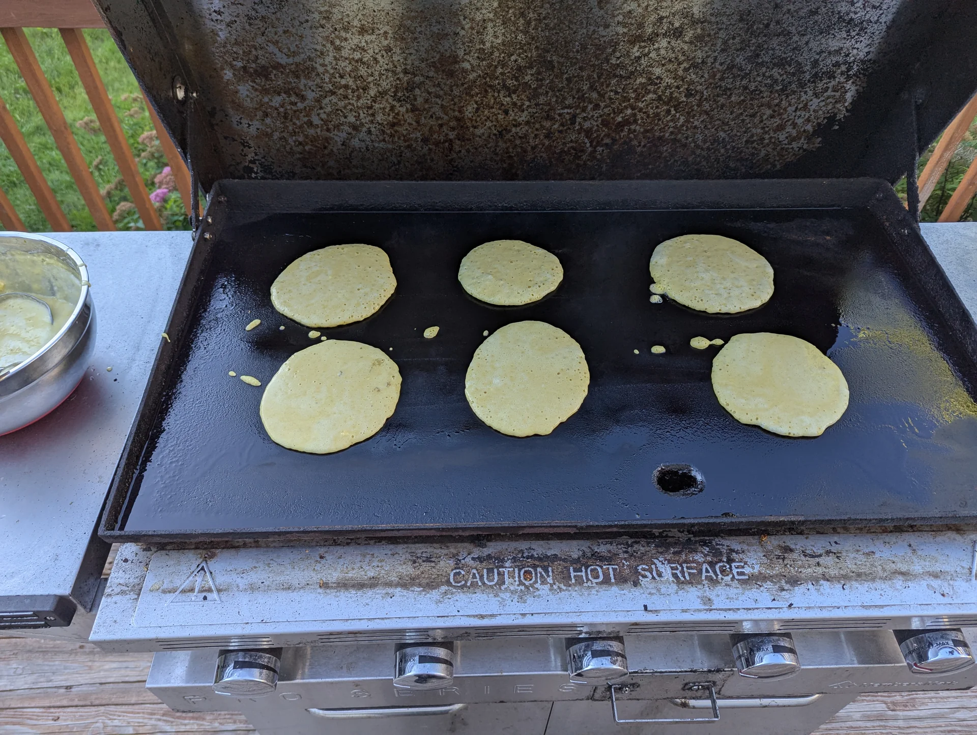 Pancakes cooking together on the flattop